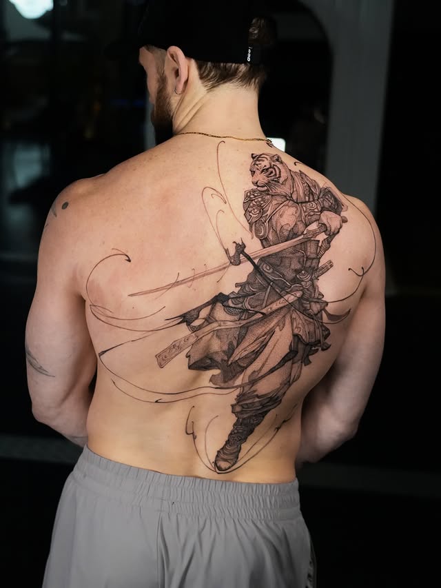 Samurai warrior and tiger full back tattoo in brush-stroke style